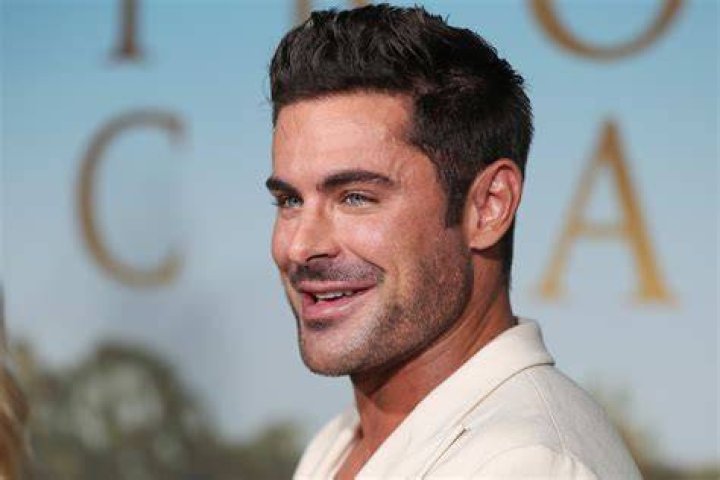 Does Zac Efron Sing get'cha head in the game?